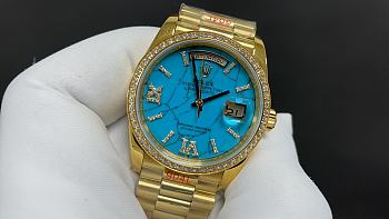 ROLEX Oyster Perpetual DAY AND  DATE  golden and blue 36 mm 2836